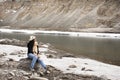 Travelers thai woman travel visit and posing portrait for take photo at view point of Confluence of the Indus and Zanskar Rivers Royalty Free Stock Photo