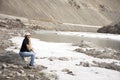 Travelers thai woman travel visit and posing portrait for take photo at view point of Confluence of the Indus and Zanskar Rivers Royalty Free Stock Photo