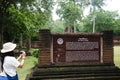 Travelers thai woman walking visit and travel take photo in ancient building and ruins of Kamphaeng Phet Historical Park