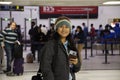 Travelers thai women and Indian and foreign walk and waiting check in inside of Indira Gandhi International Airport at terminal 2