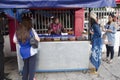 Travelers thai women and malaysian people buying rice topped malaysian curry style from local restaurant