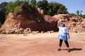 Travelers thai women people wearing indigo t shirt clothes walking travel visit and take photo with canyon cliffs and trekking