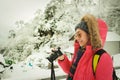 Travelers are watching photos taken with digital cameras during winter travel at yamadera hakata