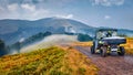 Traveling by all-terrain vehicle on the mountains. Off-road tour in Carpathian mountains, Ukraine, Europe.