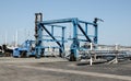 Traveling boat hoist at the marina.