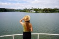 Traveling in Brazil. Panoramic view of tourist woman looking the Pampulha Modern Ensemble in Belo Horizonte, UNESCO World Heritage Royalty Free Stock Photo