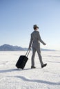 Traveling Businessman Walking with Luggage