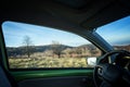 Traveling by car concept image, spring summer nature view from the car window Royalty Free Stock Photo