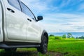 Traveling by car. Freedom car travel in holiday background concept with green nature and bright blue sky. Travel with pickup car Royalty Free Stock Photo