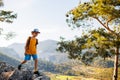 Traveling child. tourist with a backpack goes along a mountain path. hiking and active healthy lifestyle