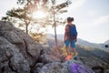 Traveling child. tourist with a backpack goes along a mountain path. hiking and active healthy lifestyle