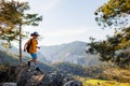 Traveling child. tourist with a backpack goes along a mountain path. hiking and active healthy lifestyle