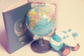 traveling concept,passport globe and toy airplane on the white background