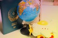 traveling concept,passport globe and toy airplane on the white background