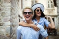 Traveling couple tourists walking around old town. Vacation, summer, holiday, tourism concept Royalty Free Stock Photo