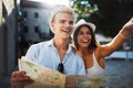 Traveling couple tourists walking around old town. Vacation, summer, holiday, tourism concept Royalty Free Stock Photo