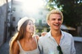 Traveling couple tourists walking around old town. Vacation, summer, holiday, tourism concept Royalty Free Stock Photo