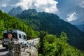 Traveling in the high mountains with camper and bicycles Royalty Free Stock Photo