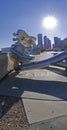 The Traveling Man is part of a three steel sculpture series at Elm Street DART Station in Dallas Royalty Free Stock Photo