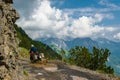 Traveling with motorcycle on the narrow road in mountains