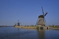 Traveling In The Netherlands. View of Traditional Romantic Dutch Windmills in Kinderdijk Village in the Netherlands Royalty Free Stock Photo