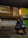 traveling at night on a Vespa, looking for a place to brew coffee, and hanging out with friends with very happy hearts