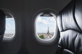 Traveling Paris, France famous landmark and travel destination in Europe. Aerial view Eiffel Tower through airplane window Royalty Free Stock Photo