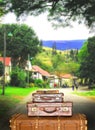 Traveling suitcases in a small town Royalty Free Stock Photo