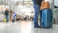 Traveling and terminal airport concept - Close up young handsome asia traveler man in casual wear standing in modern terminal