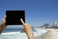 Traveling Tourist Using Tablet at Rio de Janeiro Brazil Beach
