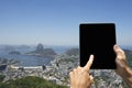Traveling Tourist Using Tablet at Rio de Janeiro Brazil Skyline