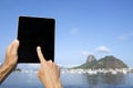 Traveling Tourist Using Tablet at Sugarloaf Rio de Janeiro Brazil