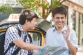 Traveller asking directions from taxi driver to get him to landmark in bangkok thailand Royalty Free Stock Photo