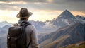 A Traveller With Backpack Admires Breathtaking Mountains