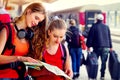 Traveller girl female backpack and tourism outfit at railway station