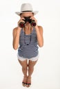 Traveller girl looking through binocular. Royalty Free Stock Photo