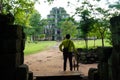 A TRAVELLER IN Koh Ker Temple in Cambodia Royalty Free Stock Photo