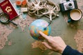 traveller pointing globe. High quality photo Royalty Free Stock Photo