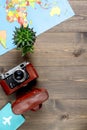 Traveller set with camera and map on wooden background top view mock-up Royalty Free Stock Photo