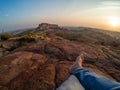 Traveller sitting in front of Mehrangarh Fort