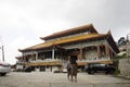 Traveller thai woman asking malaysian people at front of Kek Lok Si Chinese and Buddhist temple Royalty Free Stock Photo