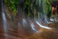 Traveller with waterfall landscape in tropical Rainforest , slo