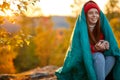 Traveller woman with cup of tea ,enjoys the scenery in the mountains Royalty Free Stock Photo