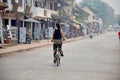 Traveller women use bicycle for biking visit and sightseeing around ancient city of Luang Prabang