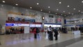 Travellers buy ticket from train counter at Kansai Airport Station in Osaka Japan Royalty Free Stock Photo