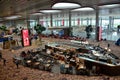 Travellers at cafe inside new terminal four at Singapore Changi Airport