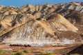 Travellers with camels in Colorful mountain in Danxia landform in Zhangye, Gansu of China Royalty Free Stock Photo