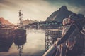 Travellers couple in Reine village, Norway Royalty Free Stock Photo