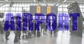 Heathrow Airport - Terminal 5 - travellers looking for flight information Royalty Free Stock Photo