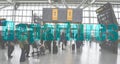 Heathrow Airport - Terminal 5 - travellers looking for flight information Royalty Free Stock Photo